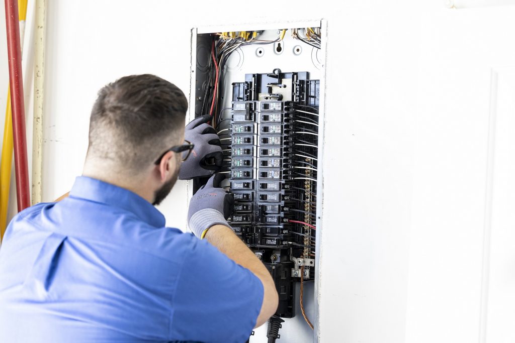 electrical panel installation by a technician