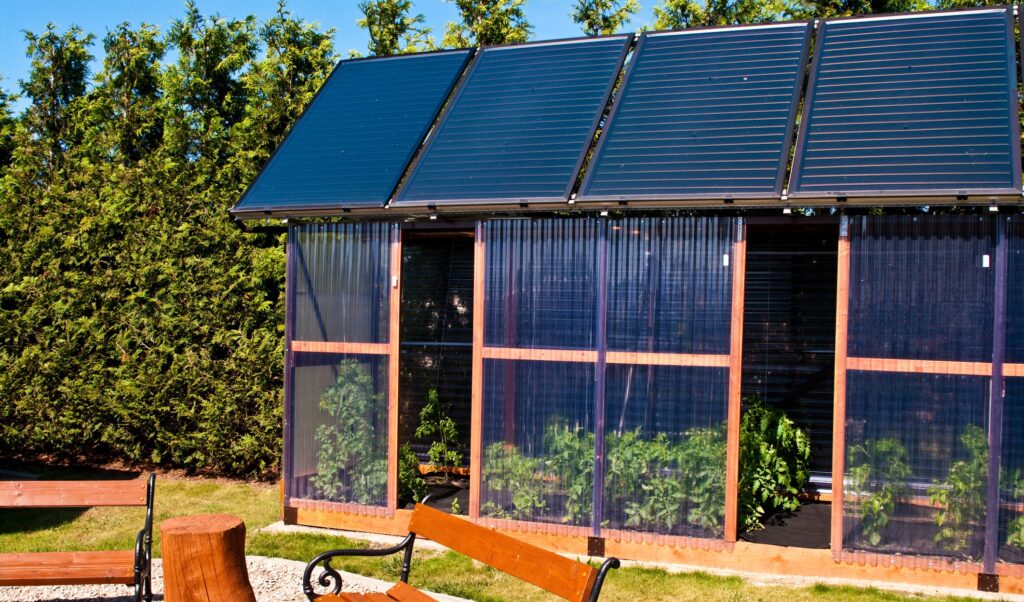 green house with solar panels